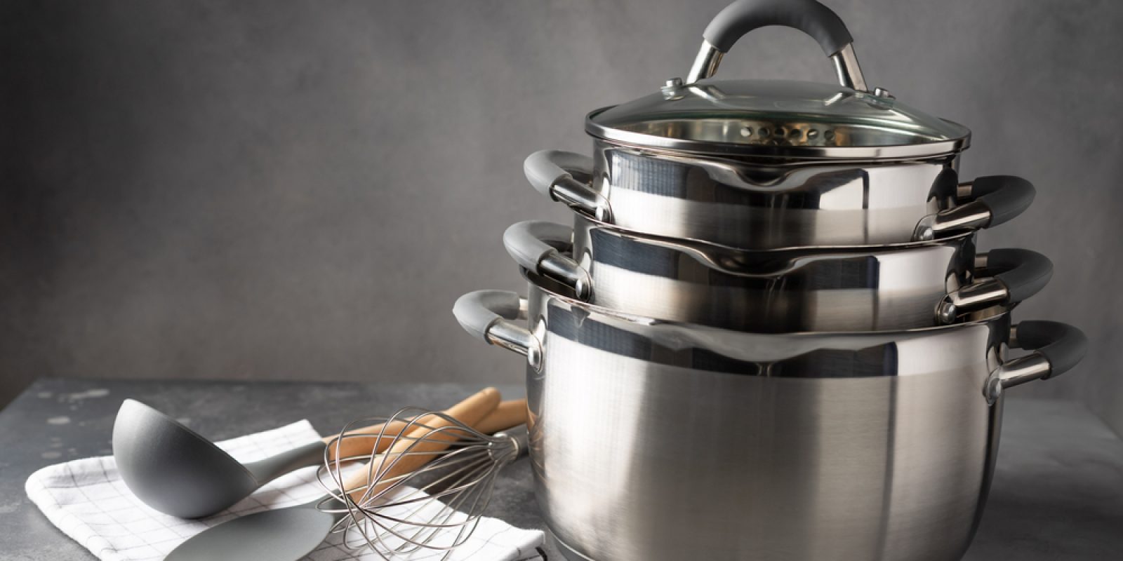 Set,Of,Various,Cookware,And,Utensils,On,Dark,Background.,Recipe